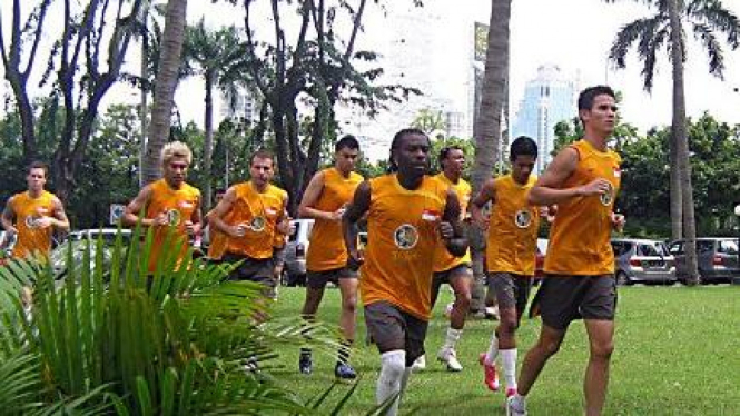 Tim nasional Singapura sedang jogging