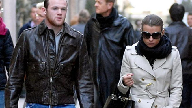 Wayne Rooney bersama istrinya Coleen