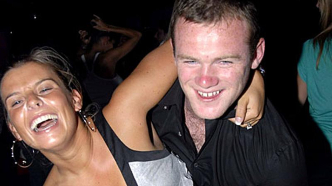 Wayne Rooney bersama istrinya Coleen