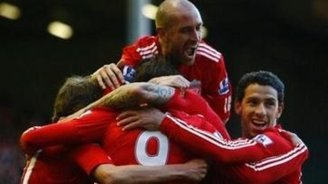 Pemain Liverpool merayakan gol