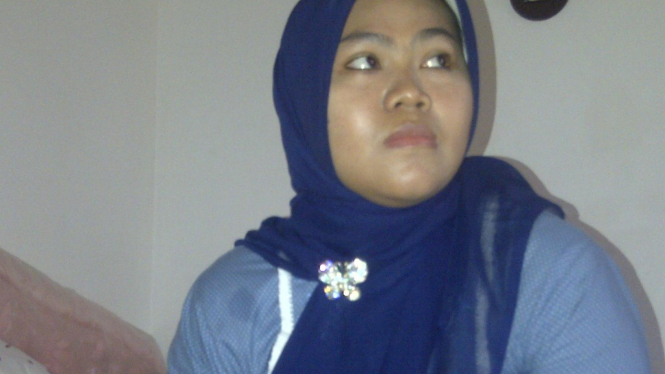 Siti Nursobah, istri tersangka terorisme Imam Firdaus (IF)  				
