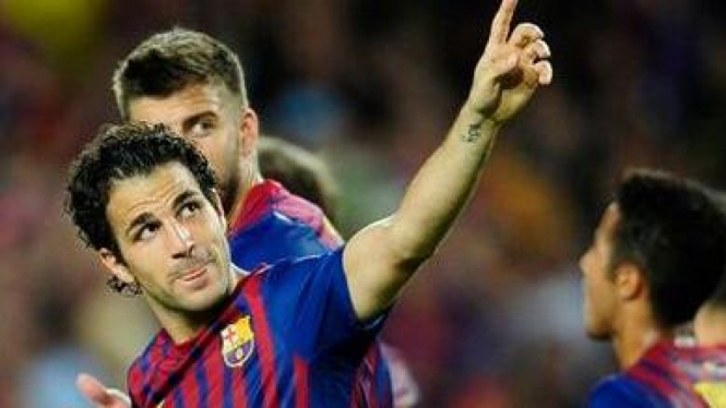 Cesc Fabregas usai mencetak gol pertama untuk Barcelona