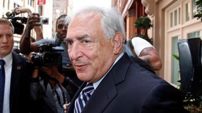 Dominique Strauss-Kahn setelah dibebaskan dari semua tuduhan