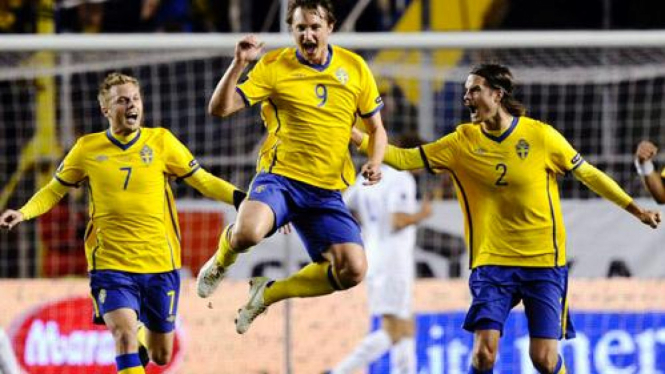Pemain Swedia merayakan kemenangan