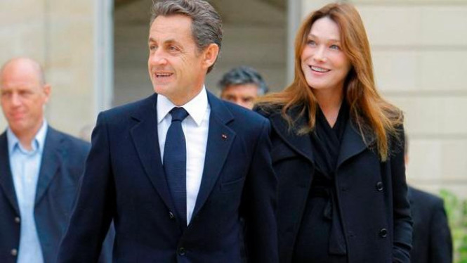 Mantan Presiden Prancis Nicolas Sarkozy dan istrinya Carla Bruni.