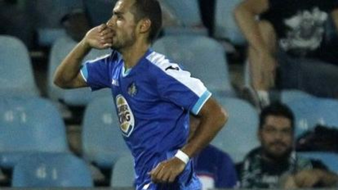 Pemain Getafe, Diego Castro, merayakan gol