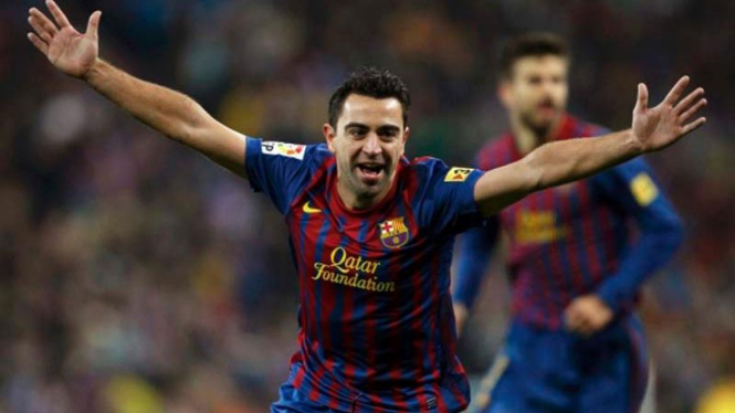 Xavi Hernandez saat melawan Madrid