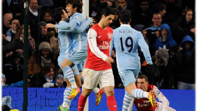 David Silva merayakan gol Manchester City lawan Arsenal