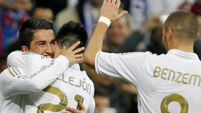 Pemain Real Madrid merayakan gol.