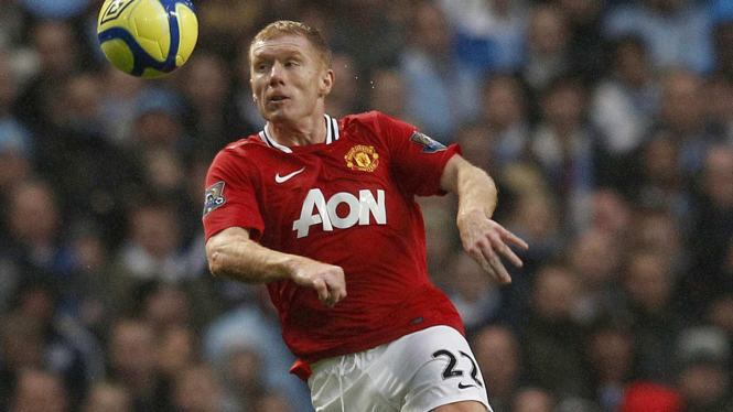 Paul Scholes saat melawan Manchester City