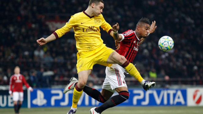 Pemain Arsenal Thomas Vermaelen dan Pemain Ac Milan Kevin Prince Boateng