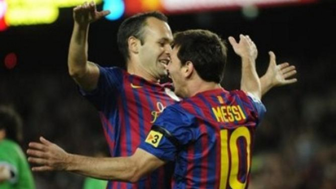 Andres Iniesta dan Lionel Messi