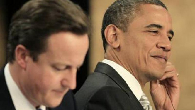 PM Inggris David Cameron (ki) dan Presiden AS Barack Obama