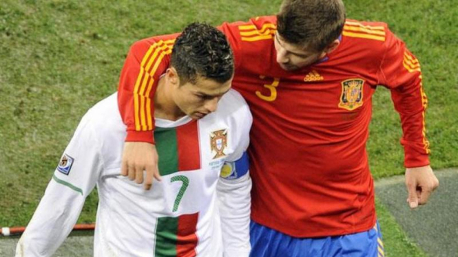 Cristiano Ronaldo dan Gerard Pique