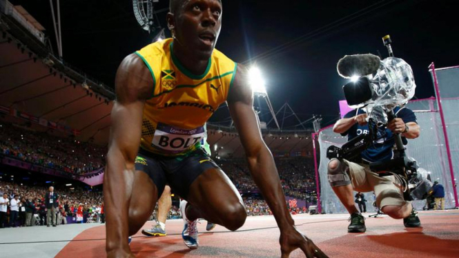 Usain Bolt Pertahankan Emas