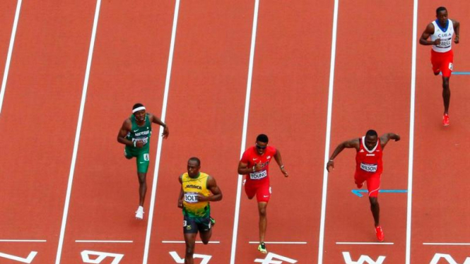 Usain Bolt (kuning/depan) di Olimpiade 2012
