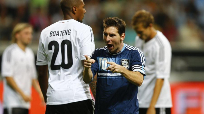 Pemain Argentina, Lionel Messi, merayakan gol ke gawang Jerman