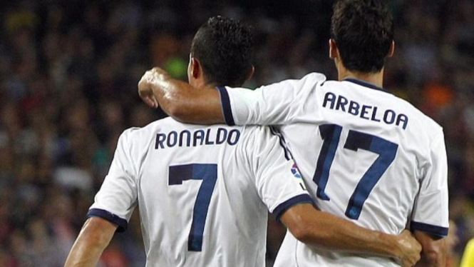 Pemain Real Madrid, Cristiano Ronaldo bersama Alvaro Arbeloa