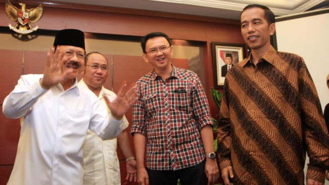 Fauzi Bowo-Nachrowi Ramli (kiri) dan Joko Widodo-Basuki Tjahaja Purnama