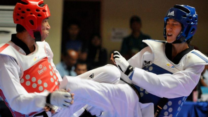 Pertandingan taekwondo di PON 2012 Riau