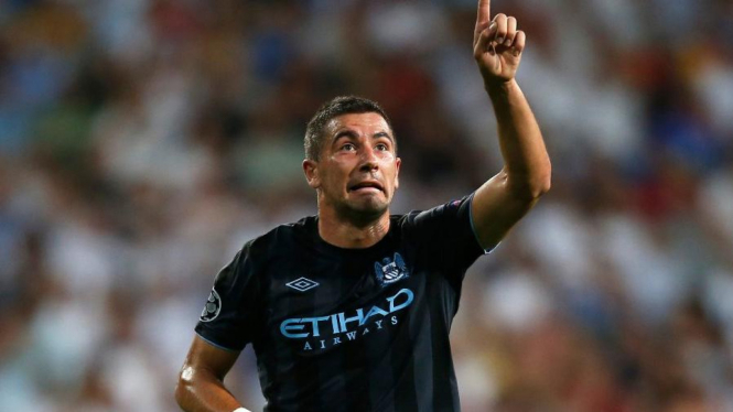 Bek Manchester City Aleksandar Kolarov usai membobol gawang Madrid