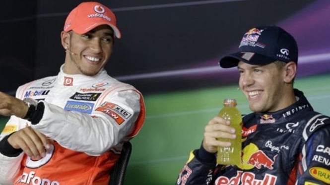 Lewis Hamilton (kiri) dan Sebastian Vettel.