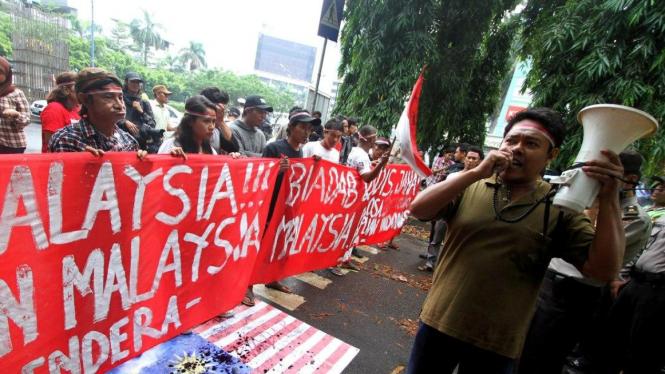 demo mengecam pemerkosaan TKI di Malaysia