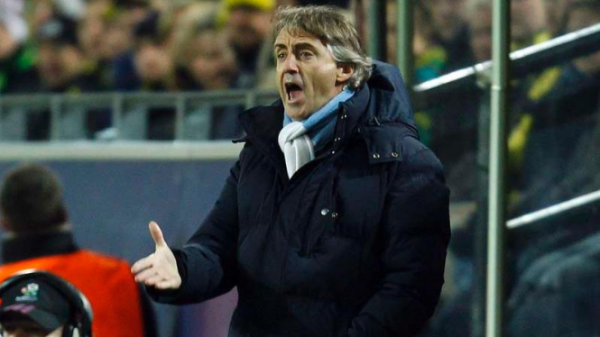 Manajer Manchester City, Roberto Mancini saat menghadapi Borussia Dortmund