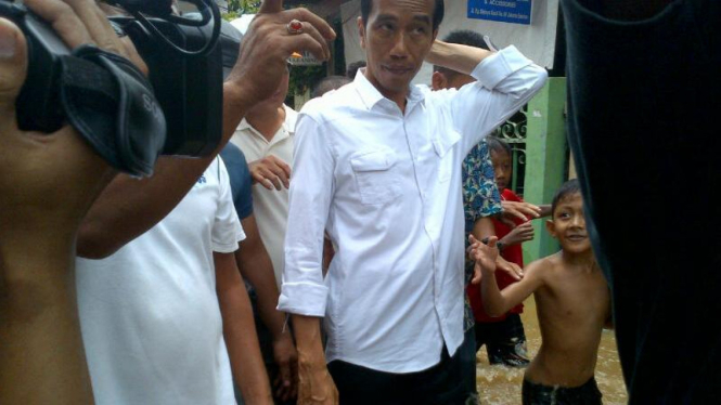 Jokowi turun ke lokasi banjir