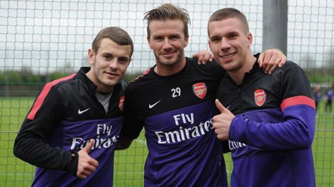 David Beckham (tengah) dengan Jack Wilshere dan Lukas Podolski