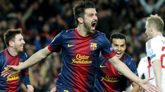 Mantan bintang Valencia dan Barcelona, David Villa merayakan gol.