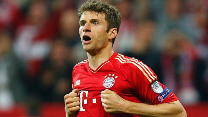 Pemain Bayern Munich, Thomas Mueller usai menjebol gawang Barcelona