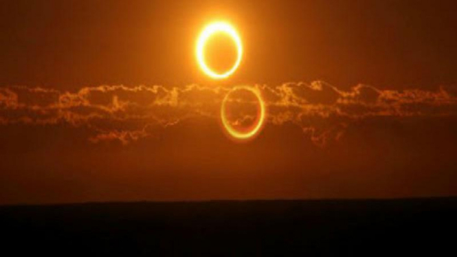 ilustrasi gerhana matahari.