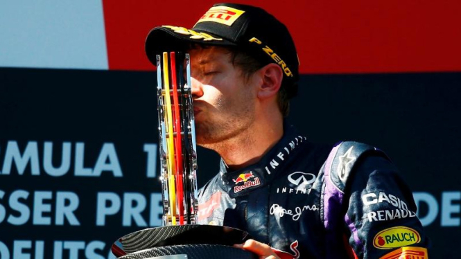 Pembalap Red Bull, Sebastian Vettel, saat juara di GP Jerman