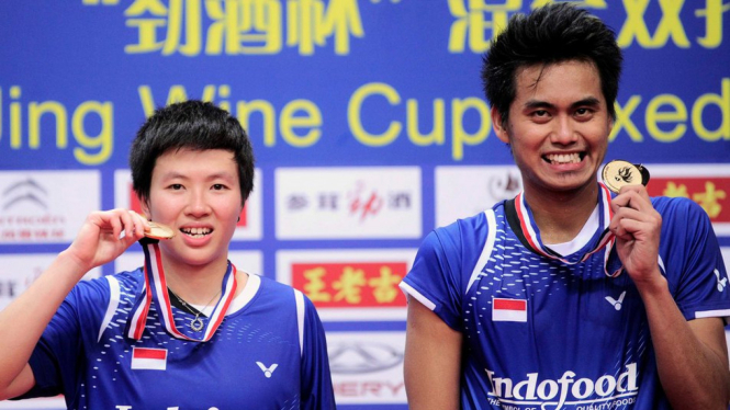 Liliyana Natsir (kiri) dan Tontowi Ahmad di Kejuaraan Dunia 2013