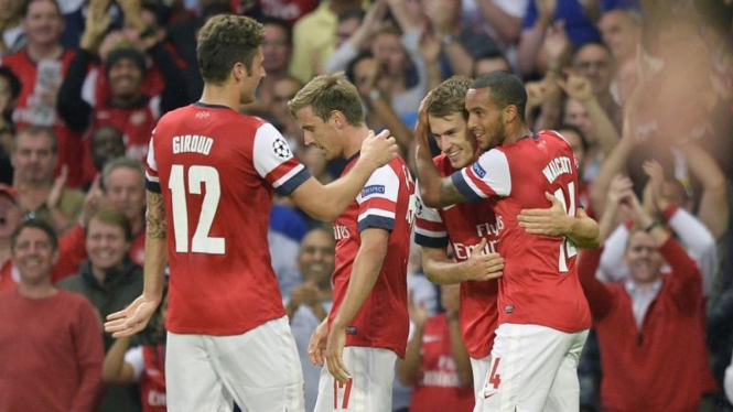 Pemain Arsenal merayakan gol Aaron Ramsey