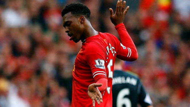 Pemain Liverpool, Daniel Sturridge saat melakukan selebrasi khasnya