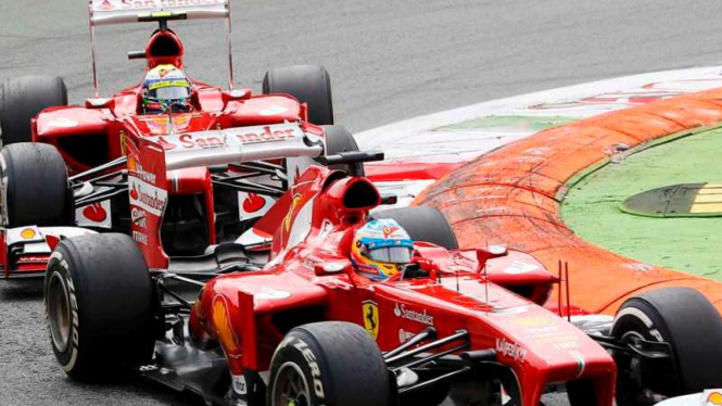 Dua pembalap Ferrari, Fernando Alonso dan Felipe Massa