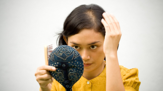 Ilustrasi wanita botak