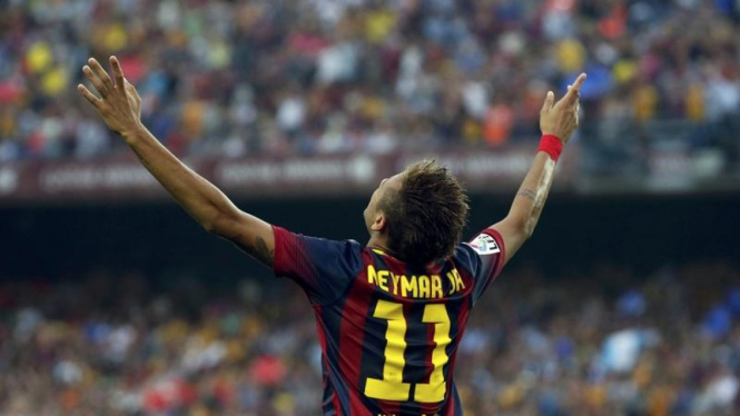 Reaksi pemain Barcelona, Neymar, usai menjebol gawang Real Madrid