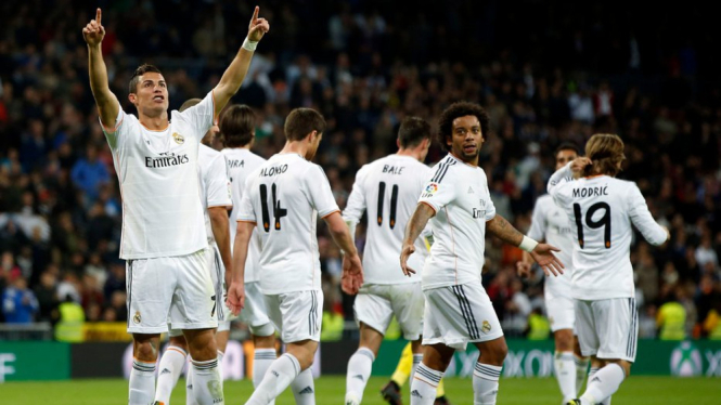 Cristiano Ronaldo merayakan gol ke gawang Sevilla