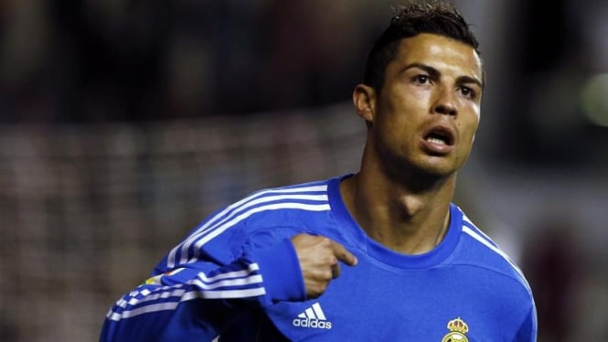 Pemain Real Madrid, Cristiano Ronaldo, usai mencetak gol