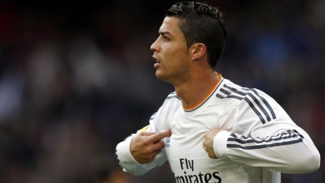 Pemain Real Madrid, Cristiano Ronaldo, usai mencetak gol