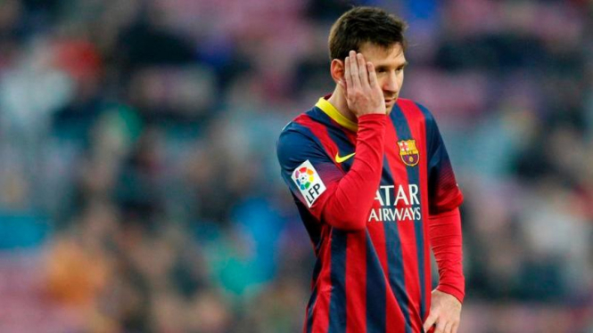 Pemain Barcelona, Lionel Messi, usai dikalahkan Valencia
