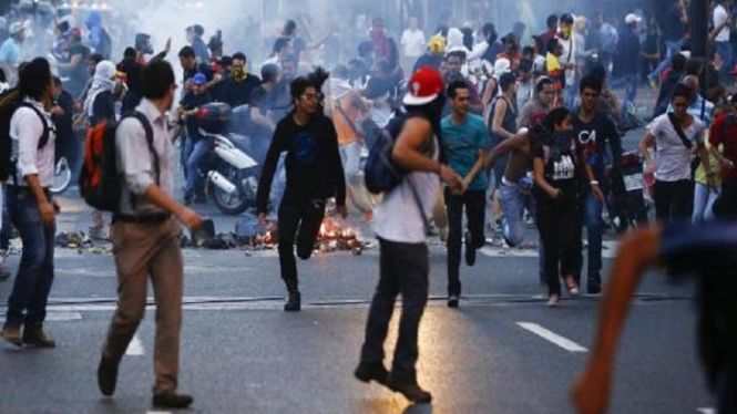 Aksi Protes warga di ibukota Venezuela, Caracas.