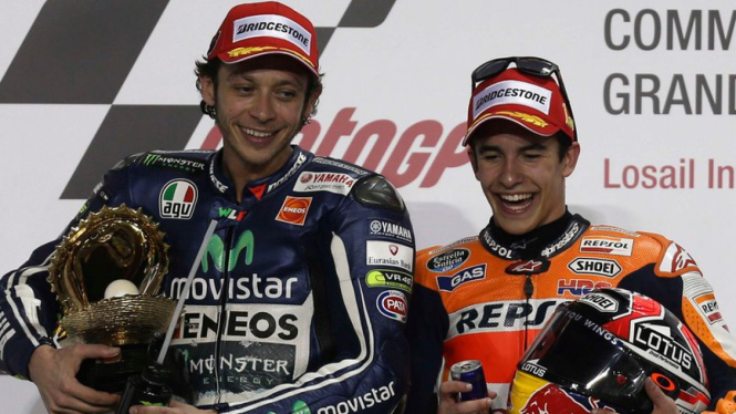 Valentino Rossi (kiri) dan Marc Marquez