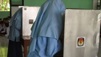 Dilarang Ambil Foto dan Merekam di Bilik Suara saat Mencoblos, ini Sanksinya!