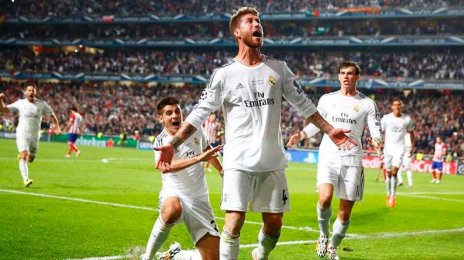 Para pemain Real Madrid merayakan gol Sergio Ramos.