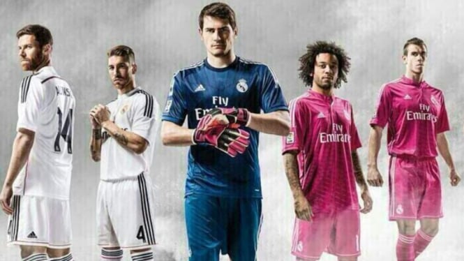 Para pemain Real Madrid menggunakan kostum untuk musim 2014/15.
