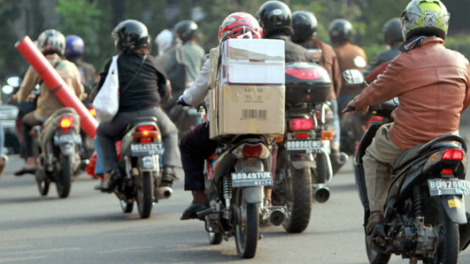 Pengendara sepeda motor. Foto ilustrasi. Pengendara sepeda motor. Foto ilustrasi.